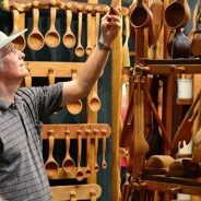 Allegheny Treenware fair booth with tons of widdled wooden spoons and kitchen utensils, wv wood art, wv artist, wv craft, west virginia wood craft